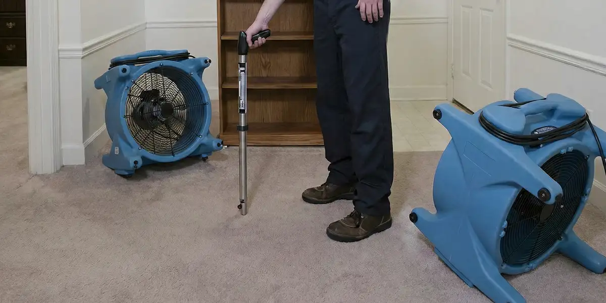 emergency water removal equipment deployed to dry a flooded residential interior in Richmond, VA