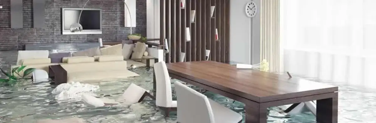 home interior affected by water damage with flooded floors and displaced furniture in Richmond, VA